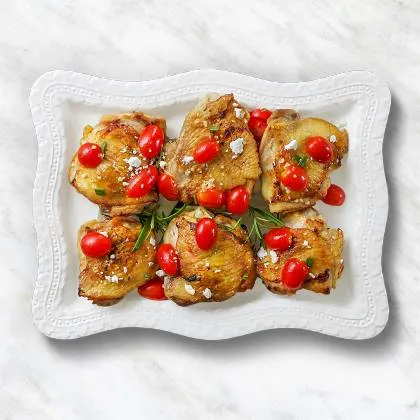 Muslos de Pollo Asados con Tomates y Romero