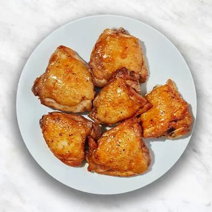 Muslos de Pollo Glaseados con Naranja
